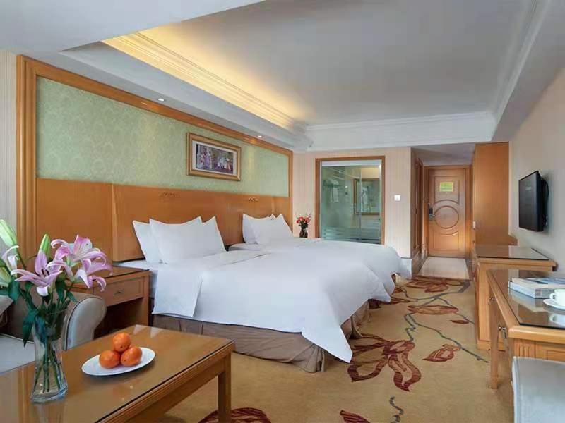 Vienna International Hotel Lijiang Yuxue Avenue Esterno foto